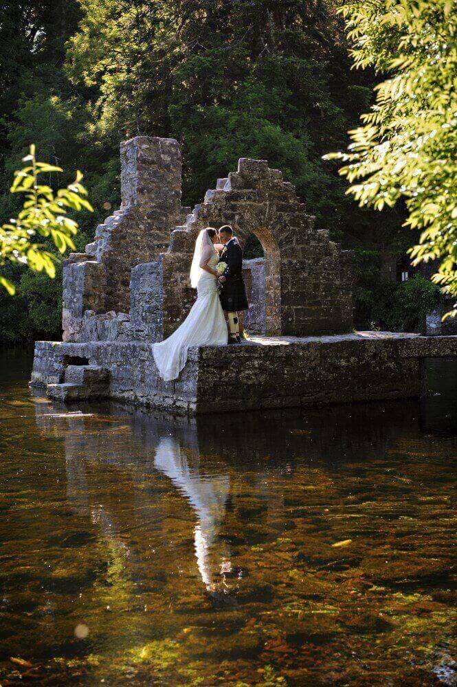 Church ruins by water