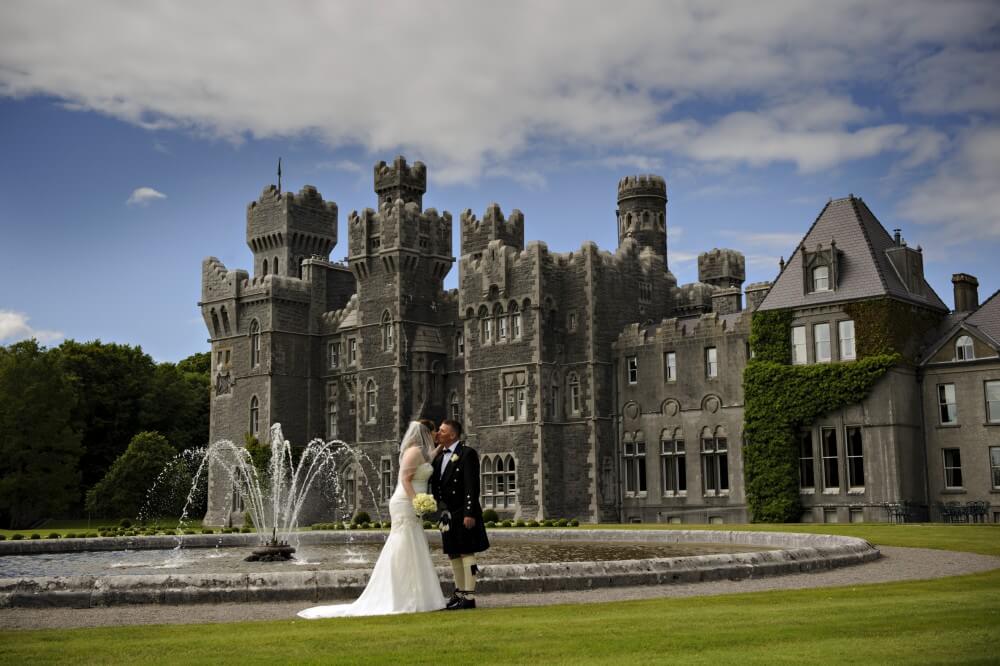 Couple with castle in background